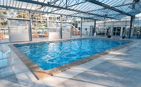 Appartement privée avec jardin et terrasse couverte dans résidence l'estuaire, avec piscine couverte, proche plage